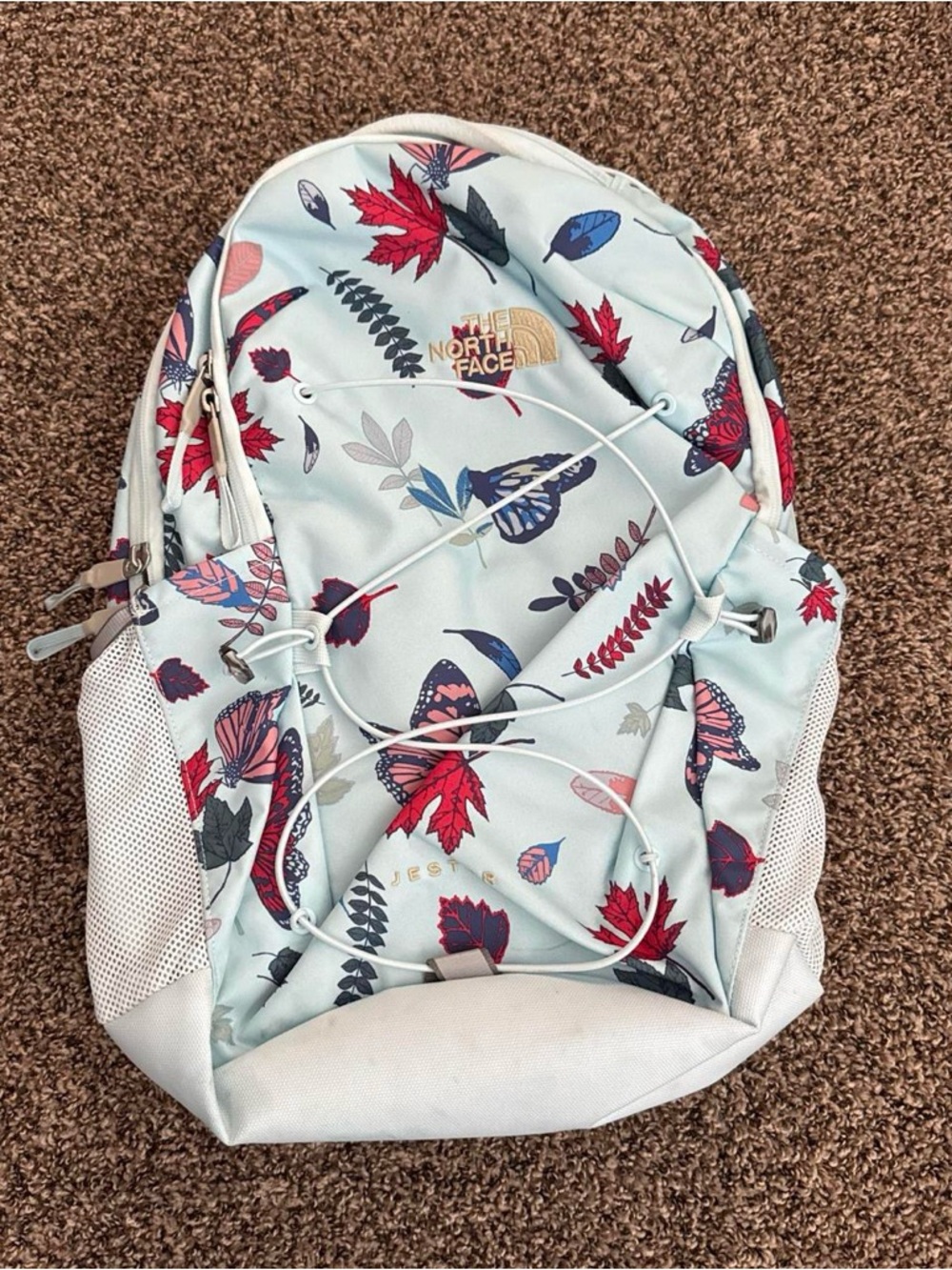The North Face Light Blue Floral & Butterfly Backpack